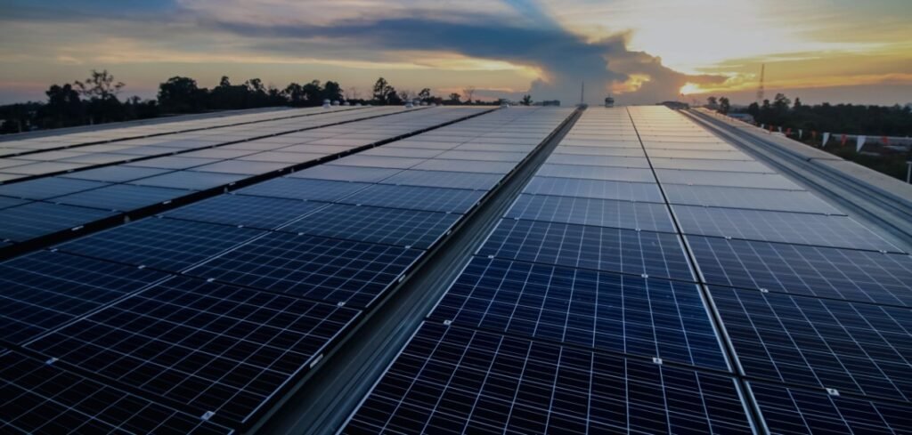 Large-scale solar thermal panels at sunset supporting the solar thermal market