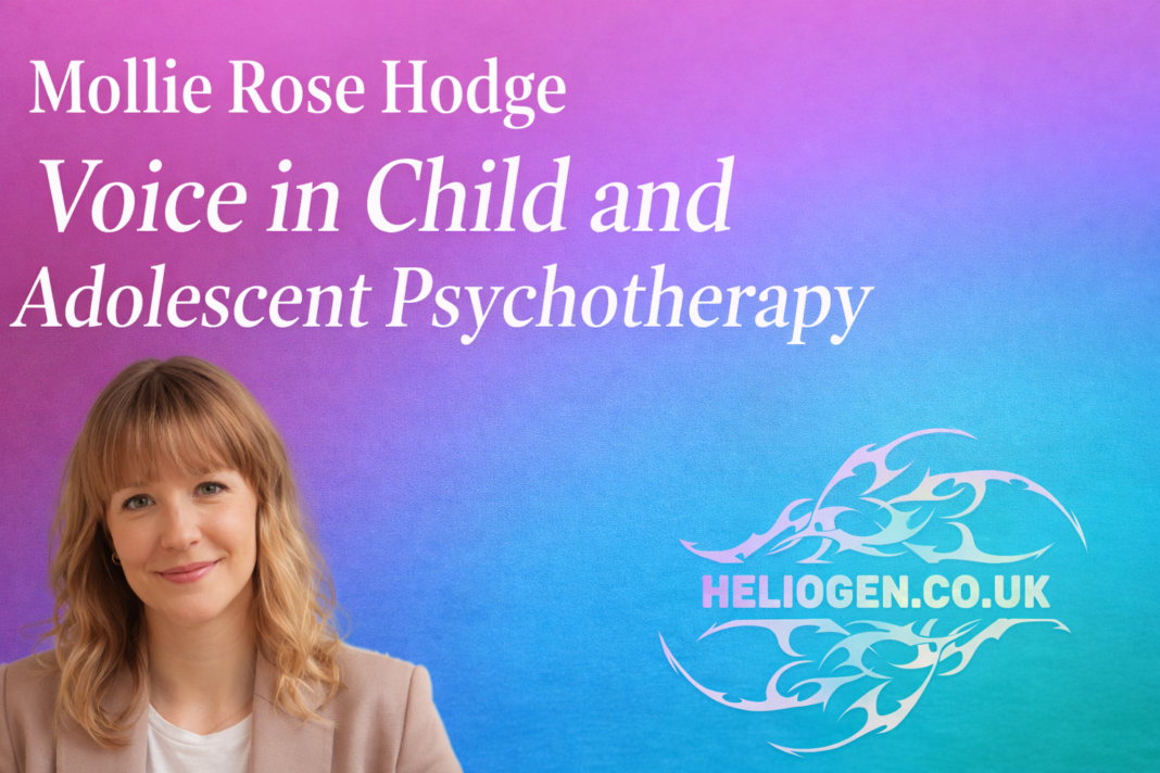 Mollie Rose Hodge smiling in a professional portrait with gradient background.